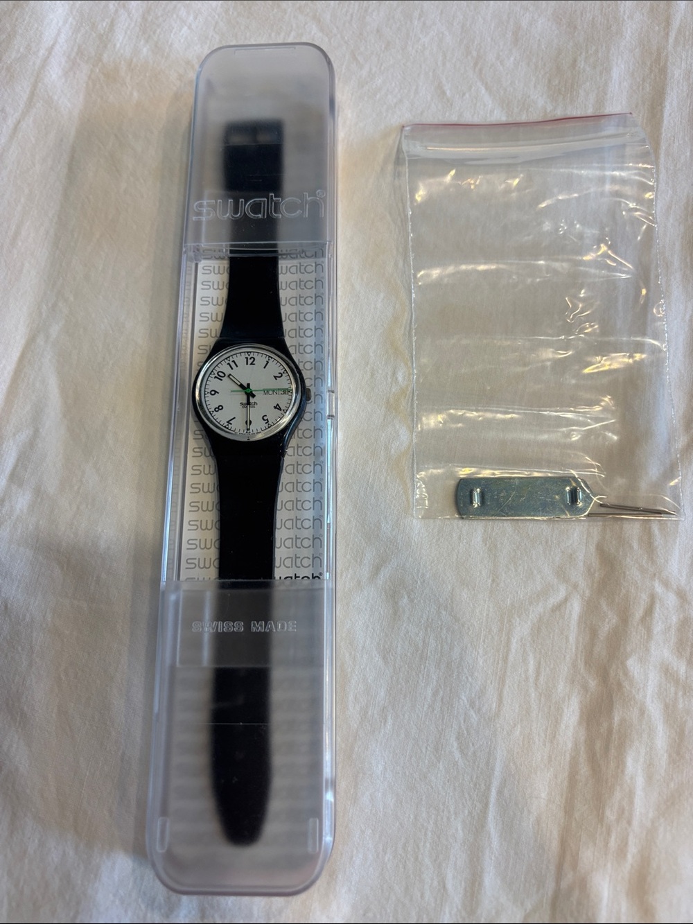 Swatch Men’s Black Strap Watch with White Dial and Green Second Hand